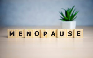 blocks of wood spelling out menopause