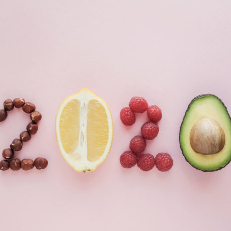 2020 made from healthy food on pastel pink background